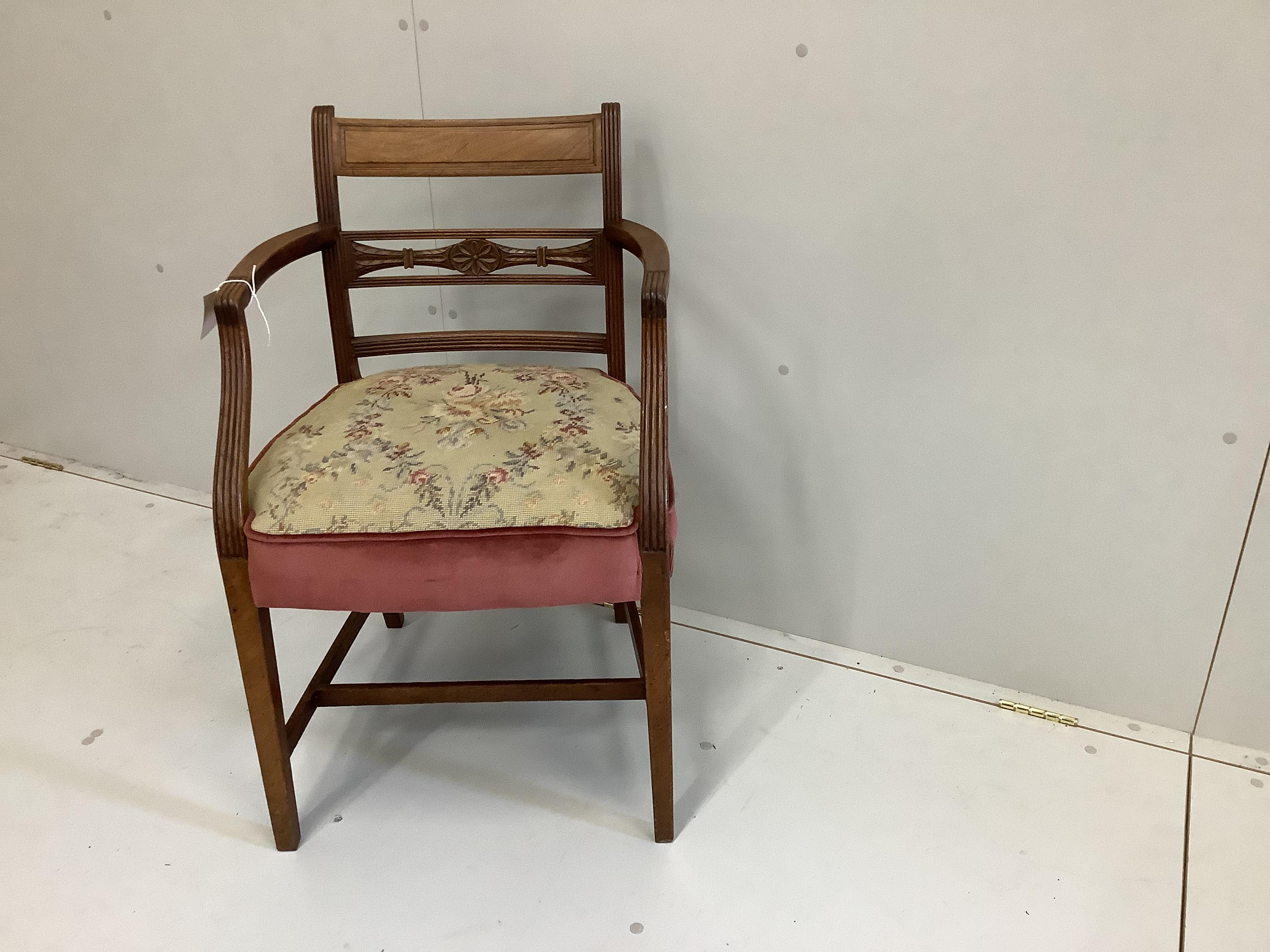 A George III mahogany elbow chair